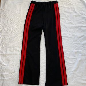 Black pants with red stripe